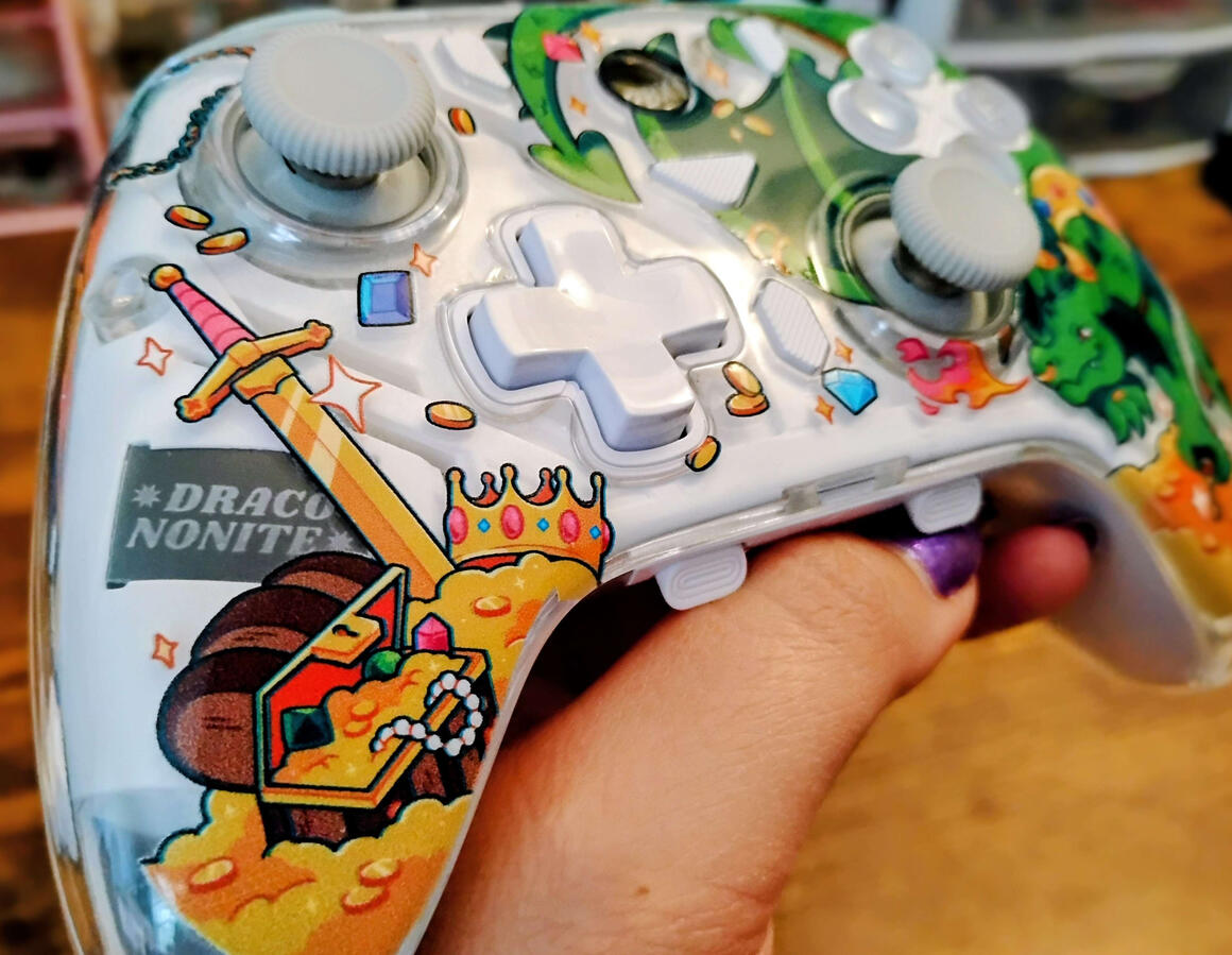 TurbX Controller Close-up of the illustration and signature.