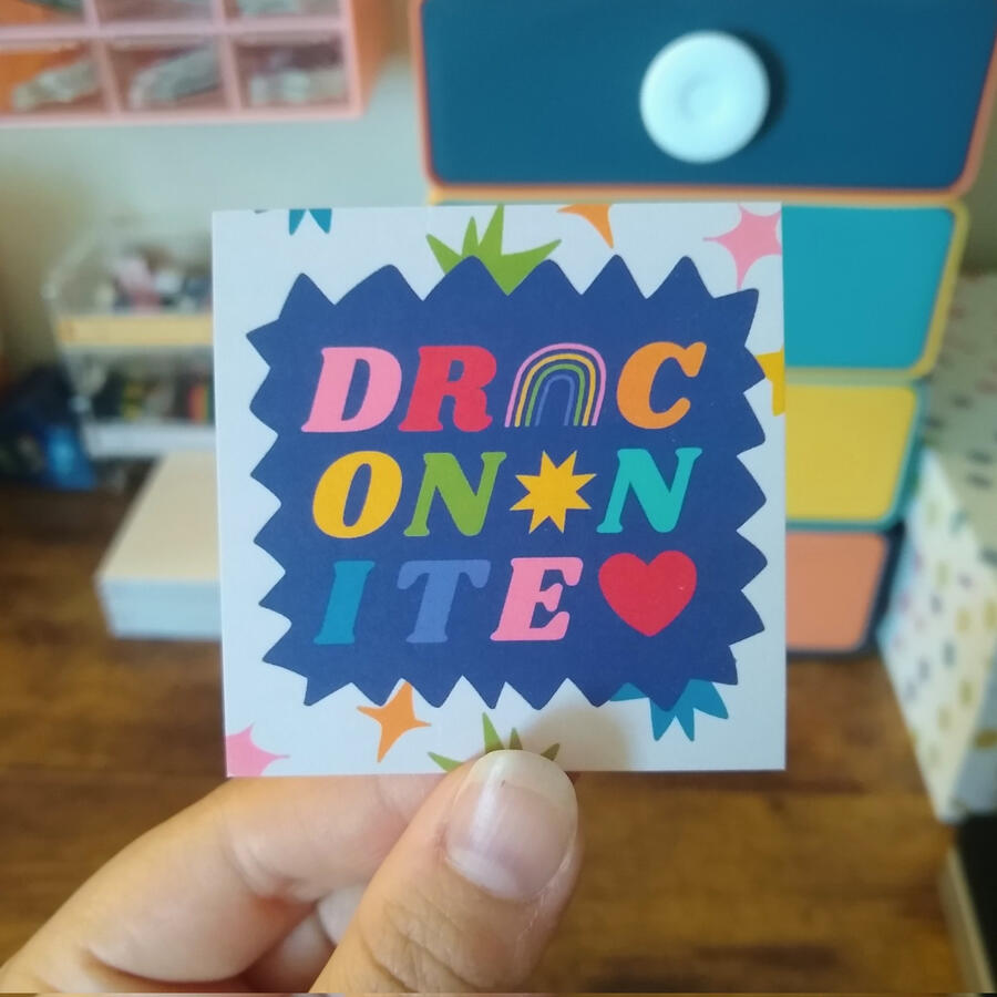 Business card with the Dracononite logo.