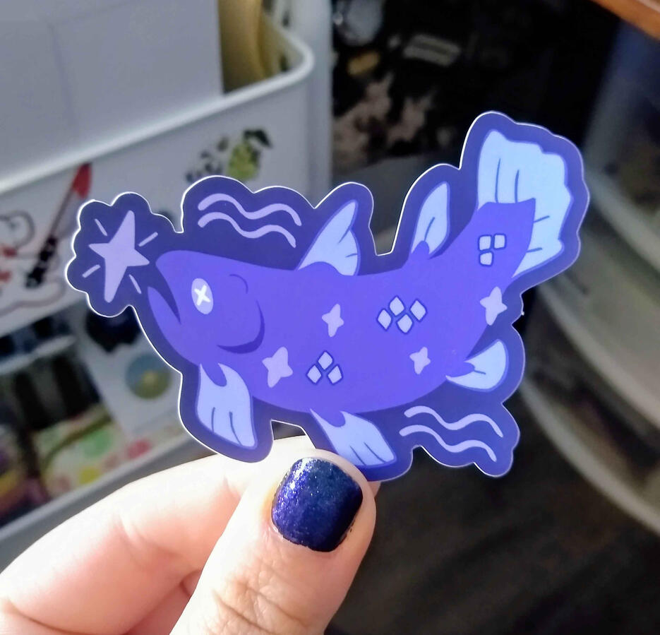 Sticker of a coelecanth eating a north star.